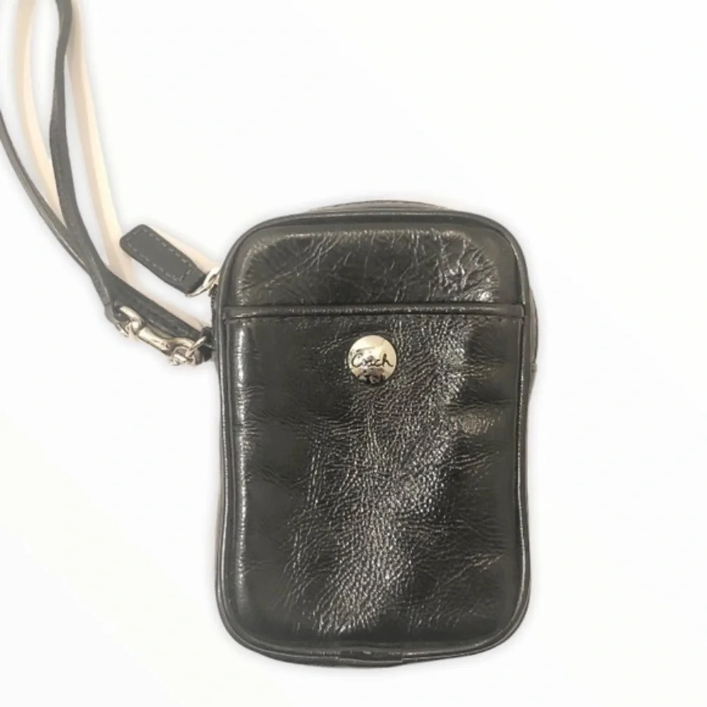 Coach black patent leather wristlet mini bag